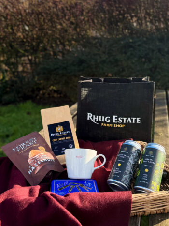 His Hamper - containing, forest feast praline crisp milk chocolate hazelnuts, Rhug estate coffee, Hapus mug, gentleman's hardware toolkit, 1 x organic stout, 1 x organic lager, in a small, back, rhug farm shop hessian bag